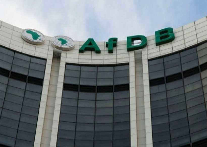 The African Development Bank headquarters building with its recognizable logo and African continent emblems